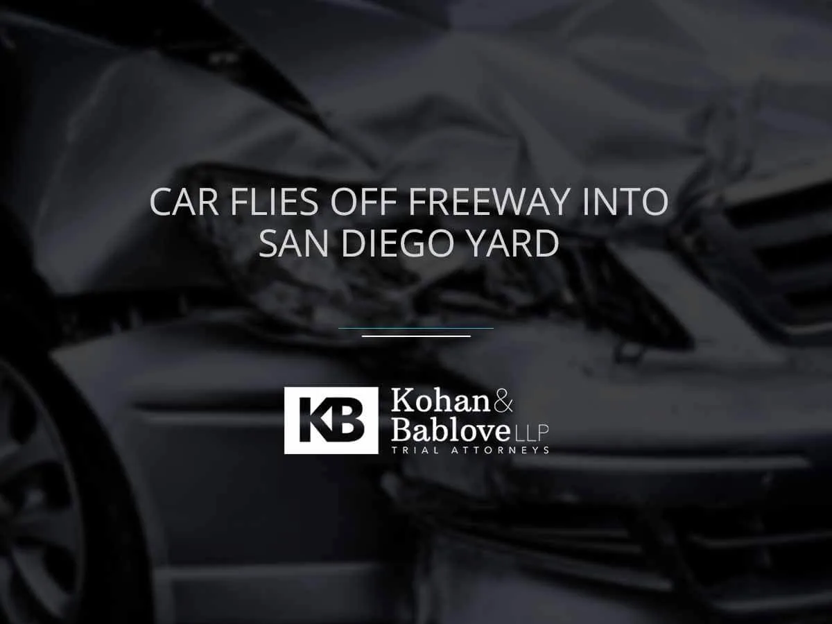 car flies off freeway into San Diego yard