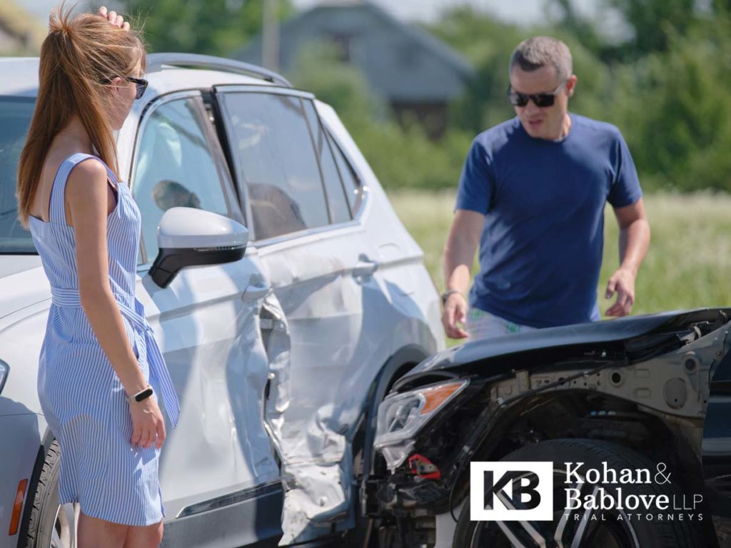 Car Accident Victims Investigate Crash Damage